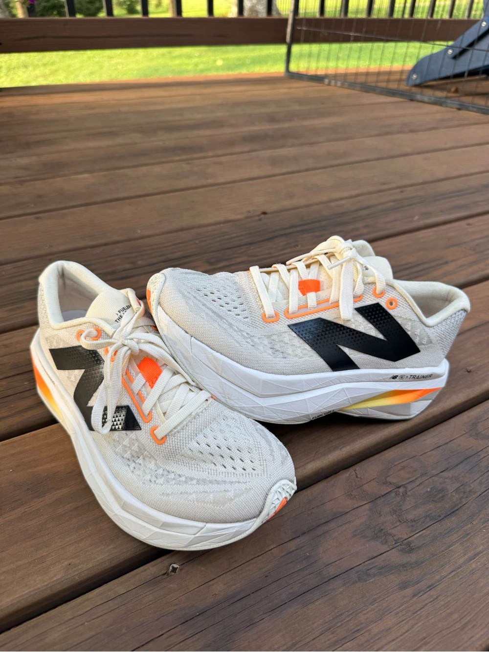 New Balance women running Sneakers with Black Logo and Orange Highlights